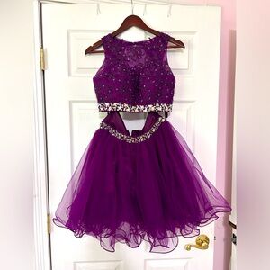 Two piece party dress.  Lots of bead work.  Size sm/m and wine color